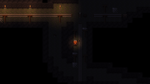 An old mine's corridor: rails running between timber supports, wall torches lighting the rock.